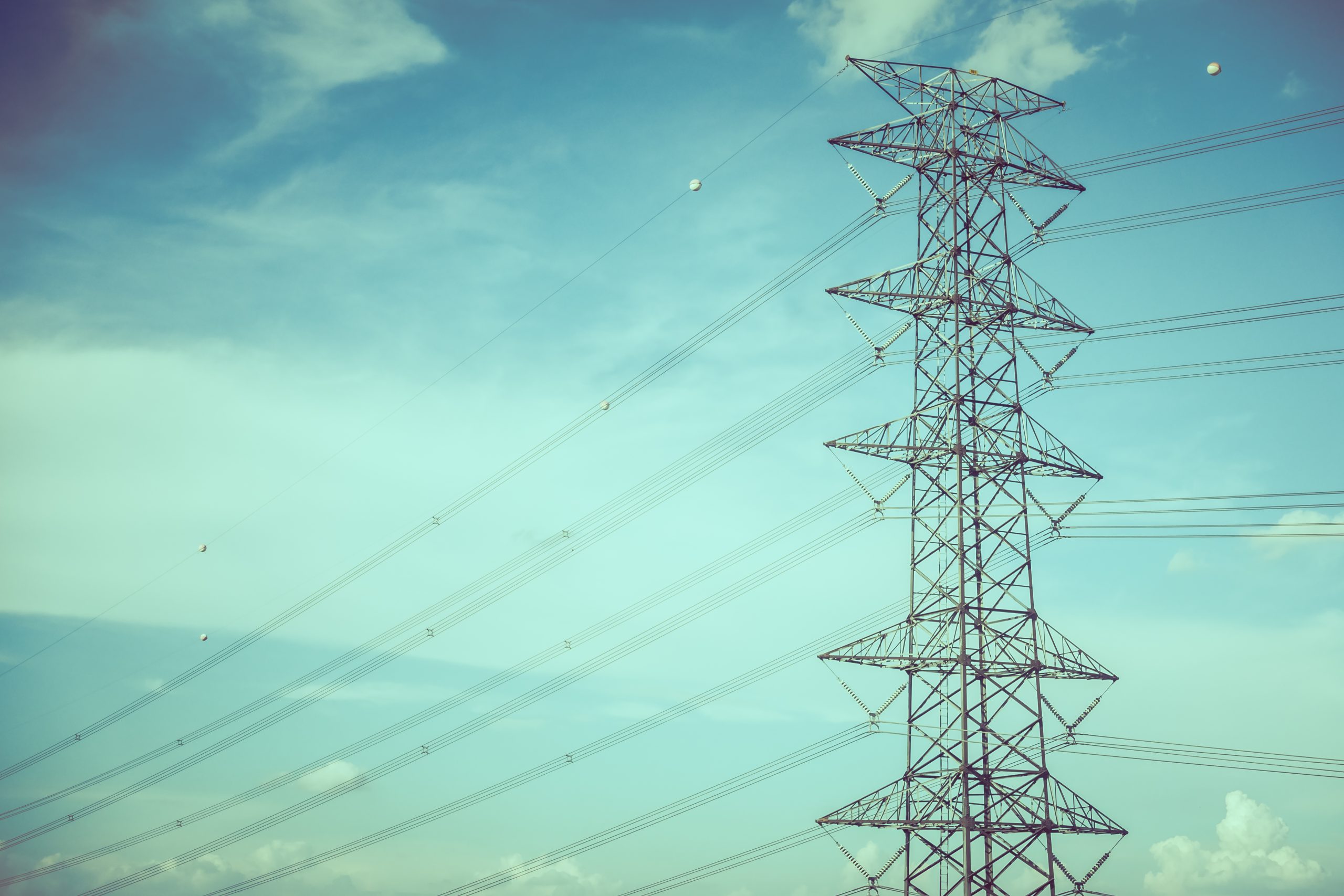 electricity pole on blue sky background - Vintage Filter