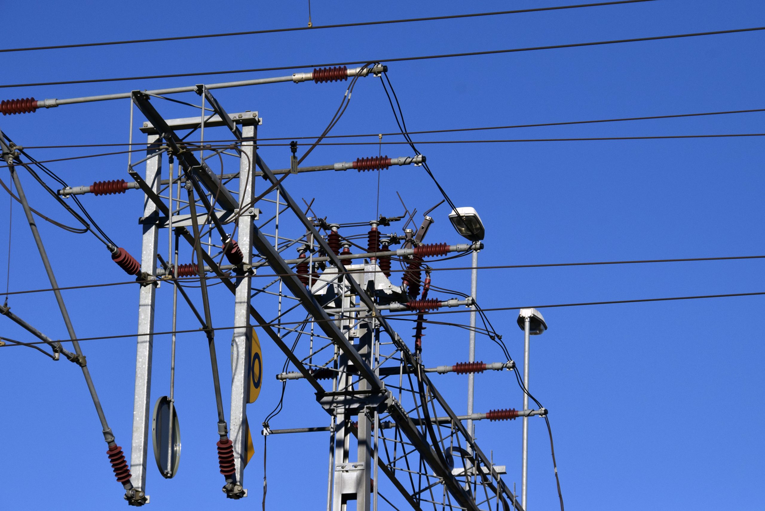 high-section-cables-against-clear-blue-sky
