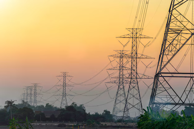 high-tension-electric-poles-sunset-sky_56644-474
