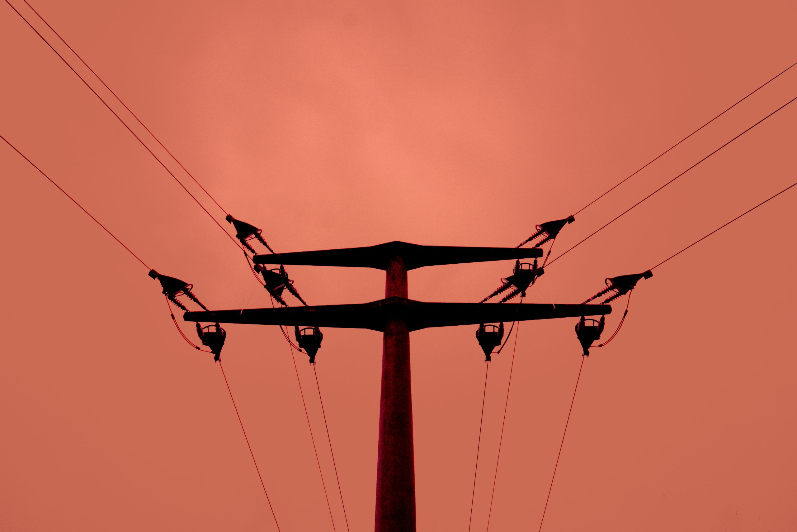 low-angle-view-silhouette-electricity-pylon-against-sky-sunset
