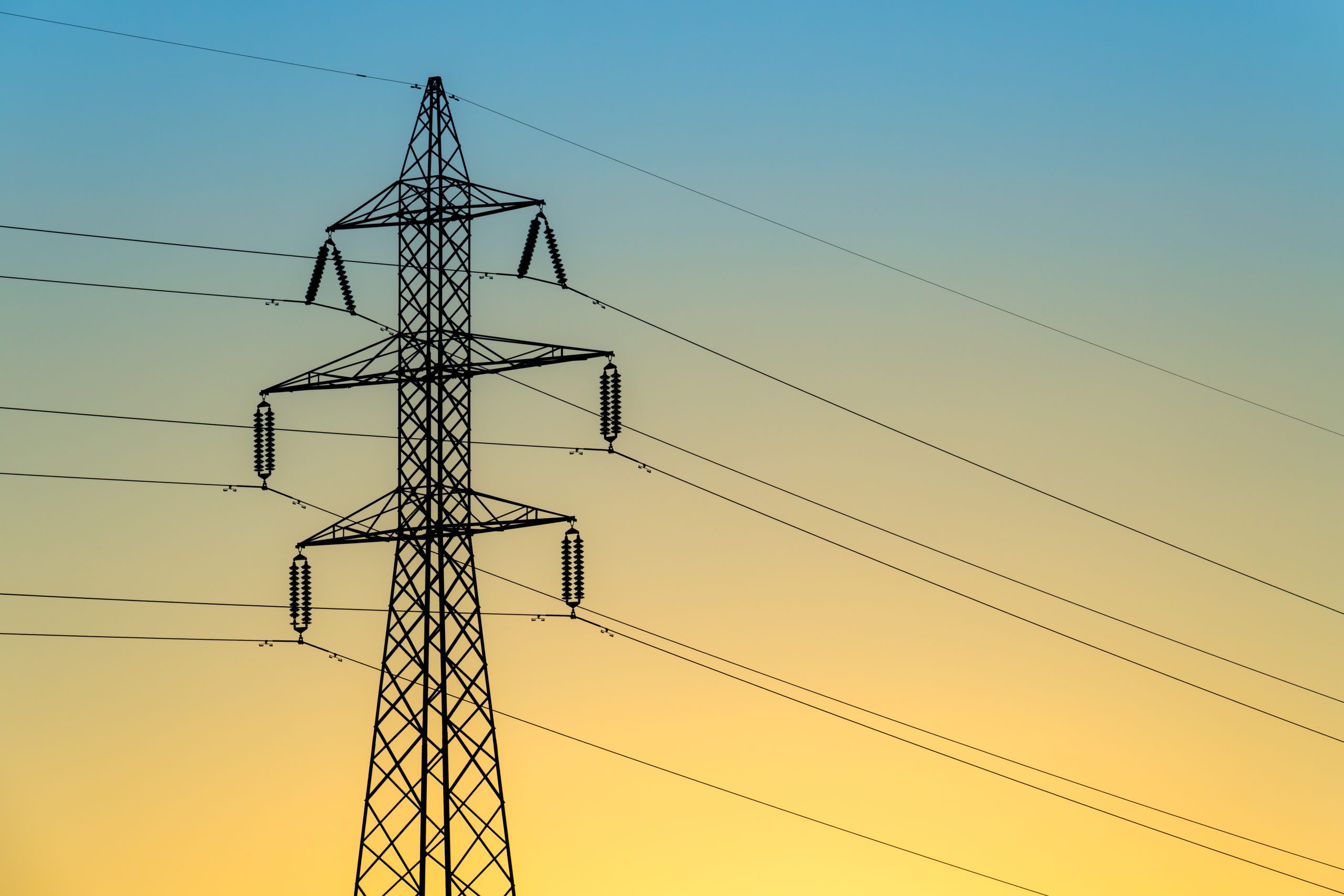 Shot of an electric tower during a sunset.